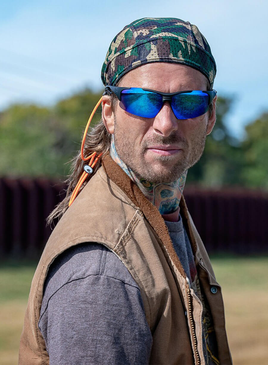 Glen Powell Hit Man Gary Johnson Brown Vest