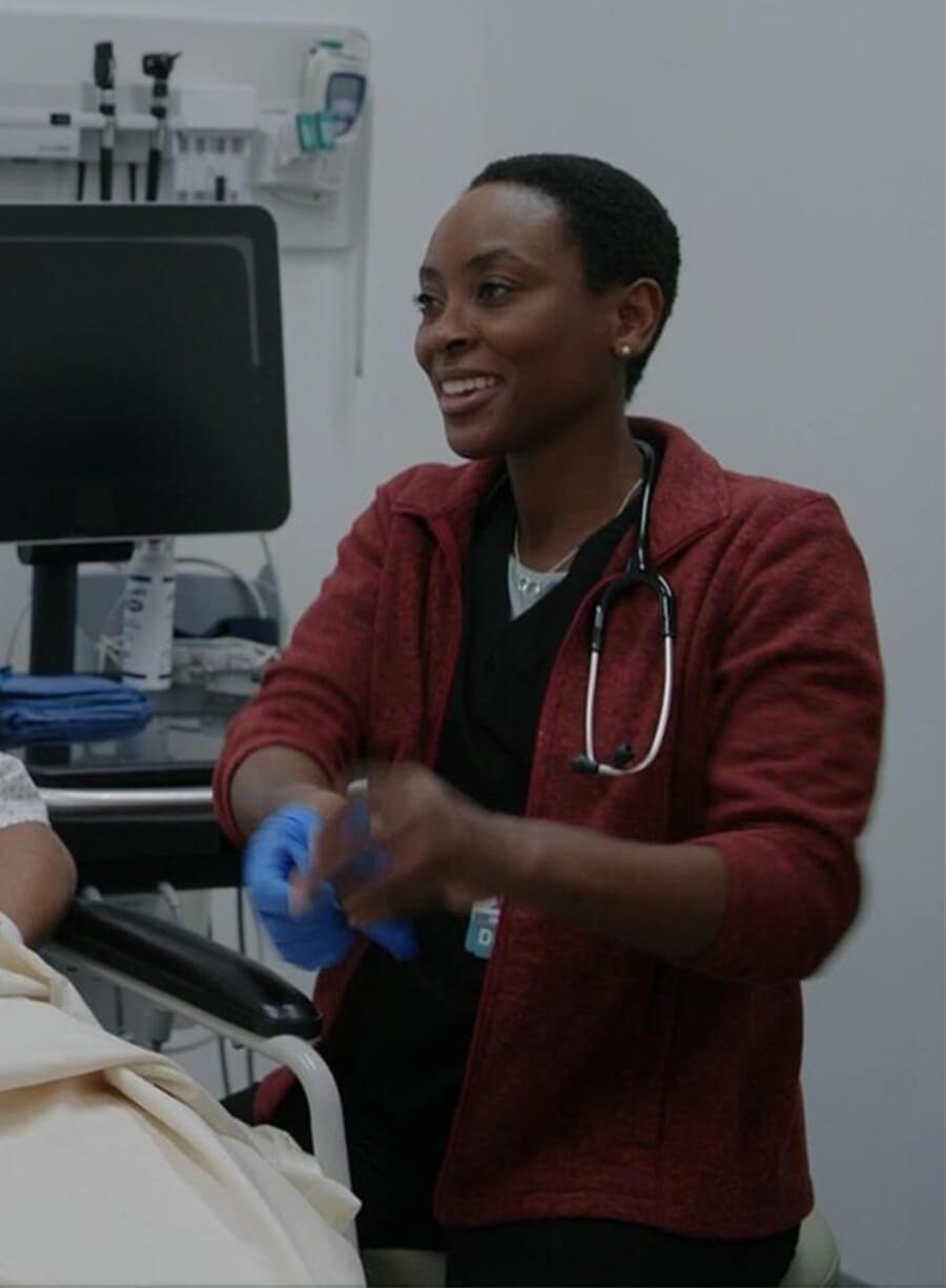 Tracy Ifeachor The Pitt 2025 Dr. Heather Collins Red jacket